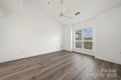 Don't miss this beautifully appointed end-unit condo with