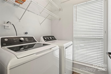 Don't miss this beautifully appointed end-unit condo with