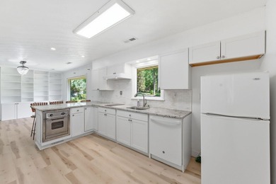 Just in time for summer, this beautifully updated waterfront - photo 20