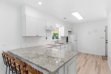 Just in time for summer, this beautifully updated waterfront - photo 21