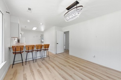 Just in time for summer, this beautifully updated waterfront - photo 23