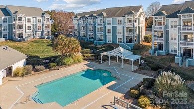 Don't miss this beautifully appointed end-unit condo with