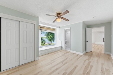 Just in time for summer, this beautifully updated waterfront - photo 38