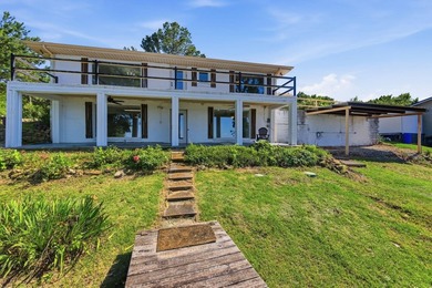 Just in time for summer, this beautifully updated waterfront - photo 43