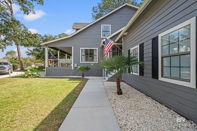 Welcome home to this beautifully updated 4-bedroom, 2.5-bath - photo 10