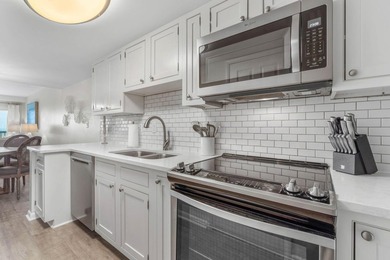 Tastefully updated ground-floor condo in the highly desirable - photo 9