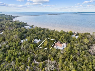 This exceptional 0.33-acre homesite offers bay views within the - photo 1