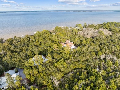 This exceptional 0.33-acre homesite offers bay views within the - photo 4