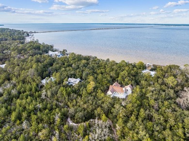 This exceptional 0.33-acre homesite offers bay views within the - photo 5