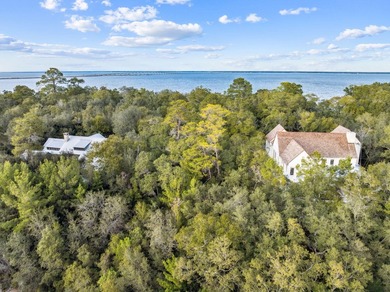 This exceptional 0.33-acre homesite offers bay views within the - photo 9