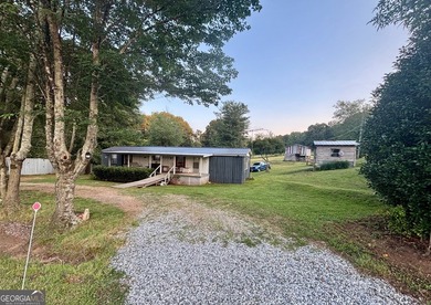 Looking for a private 2-bedroom home on acreage with no HOA? - photo 2