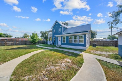 This historic 1915 gem sits on a huge corner lot with a fenced - photo 3