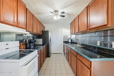 Welcome to this cozy 3-bedroom, 1-bath home offering both - photo 8