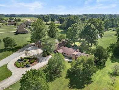 This sprawling 5,300 sq ft brick ranch blends timeless