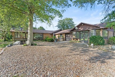 This sprawling 5,300 sq ft brick ranch blends timeless