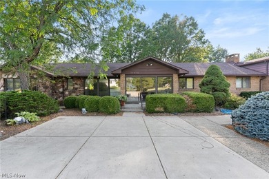 This sprawling 5,300 sq ft brick ranch blends timeless