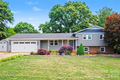 FABULOUS RENOVATION in this classic split-level home overlooking - photo 1