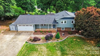 FABULOUS RENOVATION in this classic split-level home overlooking - photo 2