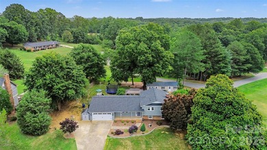FABULOUS RENOVATION in this classic split-level home overlooking - photo 4
