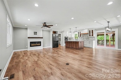 FABULOUS RENOVATION in this classic split-level home overlooking - photo 5