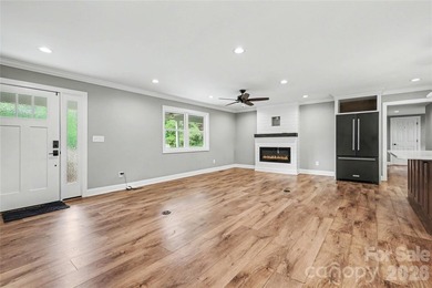 FABULOUS RENOVATION in this classic split-level home overlooking - photo 6