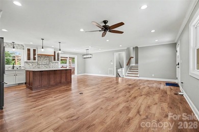 FABULOUS RENOVATION in this classic split-level home overlooking - photo 7