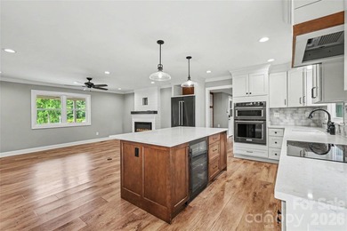 FABULOUS RENOVATION in this classic split-level home overlooking - photo 9
