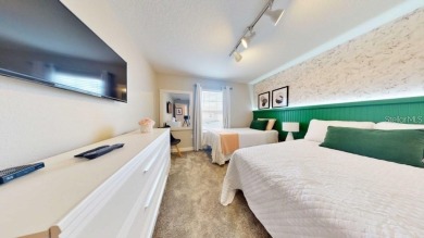 Elegantly furnished, this 4-bedroom, 3-bathroom townhouse with a - photo 14