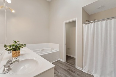 Welcome to this peaceful waterfront condo located on the second - photo 18