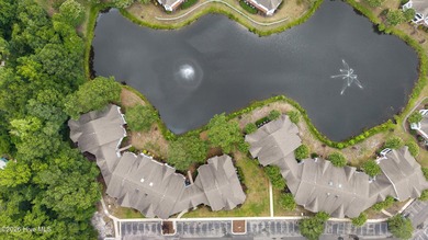 Welcome to this peaceful waterfront condo located on the second - photo 32