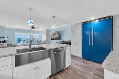 Rare opportunity to own a fully remodeled beachfront condo in - photo 4