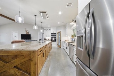 Custom-built home situated on 13.3 beautiful acres on the east - photo 17