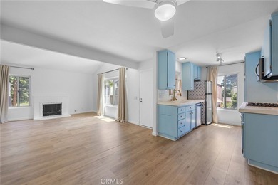 Beautifully upgraded upper-level condo in the FHA-approved - photo 2