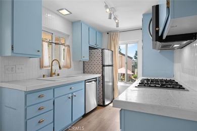 Beautifully upgraded upper-level condo in the FHA-approved - photo 8