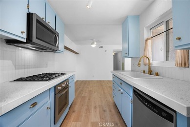 Beautifully upgraded upper-level condo in the FHA-approved - photo 10