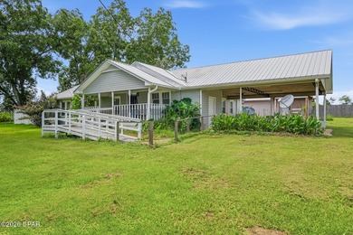 Enjoy the charm of country living with this inviting ranch-style - photo 3