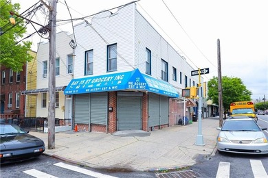 Presenting a well-maintained corner mixed-use building situated - photo 2