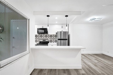 Modern coastal living East of US-1! This beautifully refreshed - photo 18