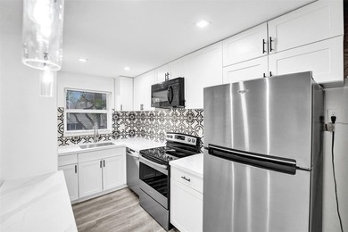 Modern coastal living East of US-1! This beautifully refreshed - photo 19