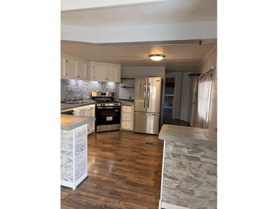 This beautifully remodeled unfurnished home blends modern - photo 2