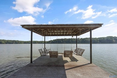 ELK RIVER WATERFRONT RETREAT! Rare 1-acre waterfront lot on the - photo 2
