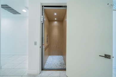 Stunning 4-story contemporary townhome with direct Lake