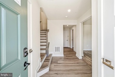 Fine end unit townhome in Amber Ridge in like new condition - photo 2