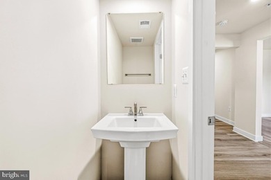 Fine end unit townhome in Amber Ridge in like new condition - photo 3