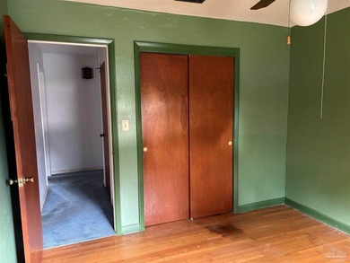 This single family residence is in need of some TLC. The owner - photo 4