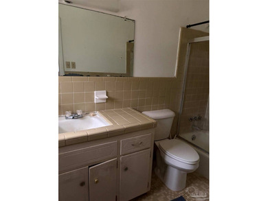 This single family residence is in need of some TLC. The owner - photo 8