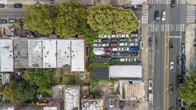 This 5,400 sq ft vacant lot offers a rare chance to build up to - photo 1