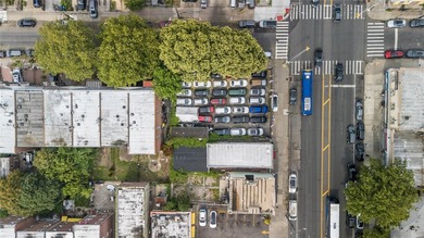 This 5,400 sq ft vacant lot offers a rare chance to build up to - photo 7