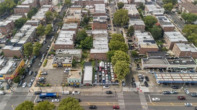 This 5,400 sq ft vacant lot offers a rare chance to build up to - photo 8