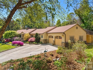 Tucked away among beautiful blooming perennials in Asheville's - photo 4